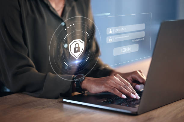 istock Hands, woman on laptop and hologram for login, cyber security software or code. IT, typing and programmer with keyboard, lock overlay and cryptography for data safety, protection and ui on computer. 1552875000
