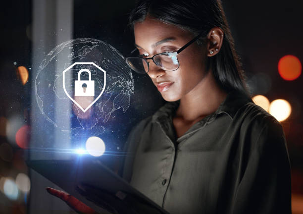 istock Tablet, global security and woman in hologram for data safety, software password and worldwide database. Cybersecurity, overlay and business person with digital technology, lock icon and night bokeh 1552877782