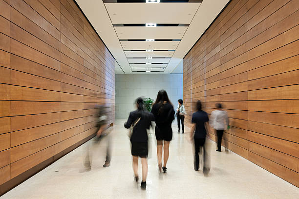 istock Business people moving along the corridor 155287813