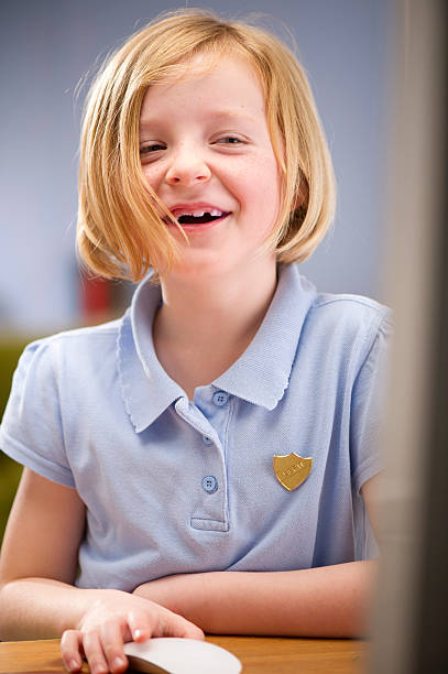 istock happy primary school girl 155287843
