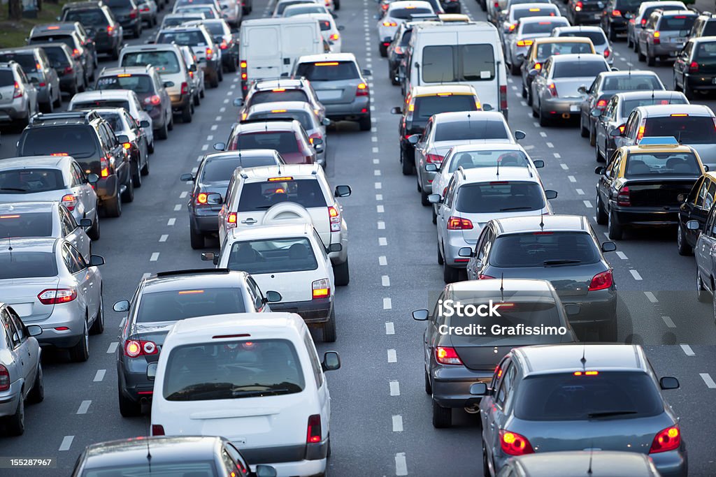Cars in rush hour with traffic at dawn http://www1.istockphoto.com/generic_image_view/26784/26784 Traffic Stock Photo