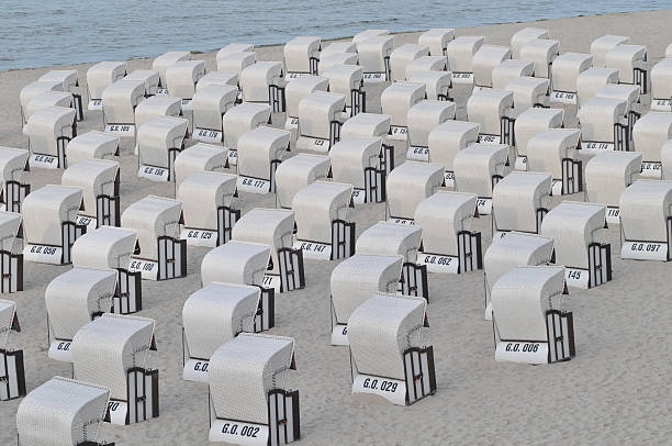 White hooded beach Chairs at the beach of Sellin