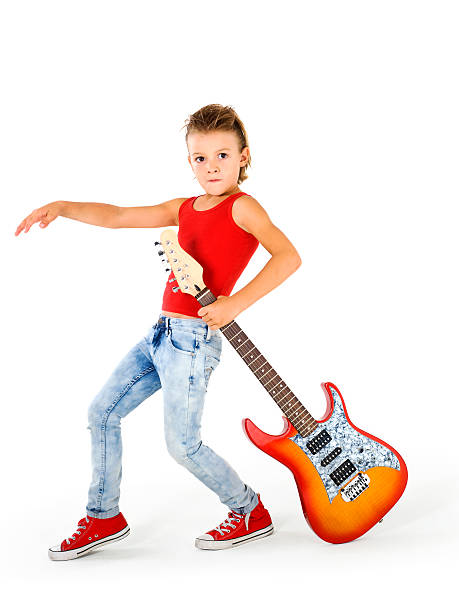 istock Rockstar kid with electric guitar 155289771