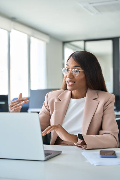 istock Professional business woman manager working in office having virtual meeting. 1552919399