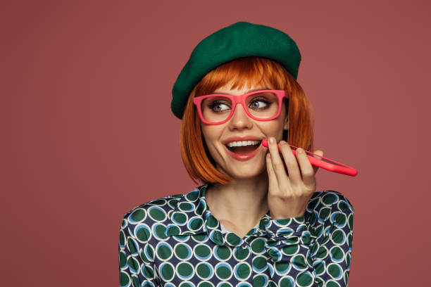 istock Beautiful emotional woman using phone 1552965113