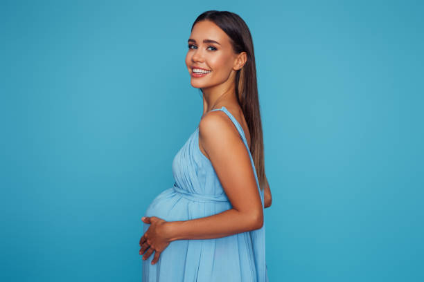 Emotional pregnant woman stock photo