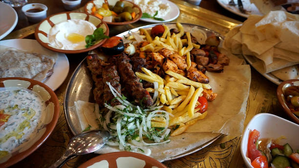 istock Jordanian Barbecue and Mezze Dishes. 1553003381
