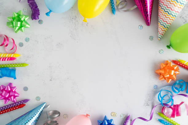 istock Birthday party flat lay composition frame, with colorful decorations and copy space. 1553006704