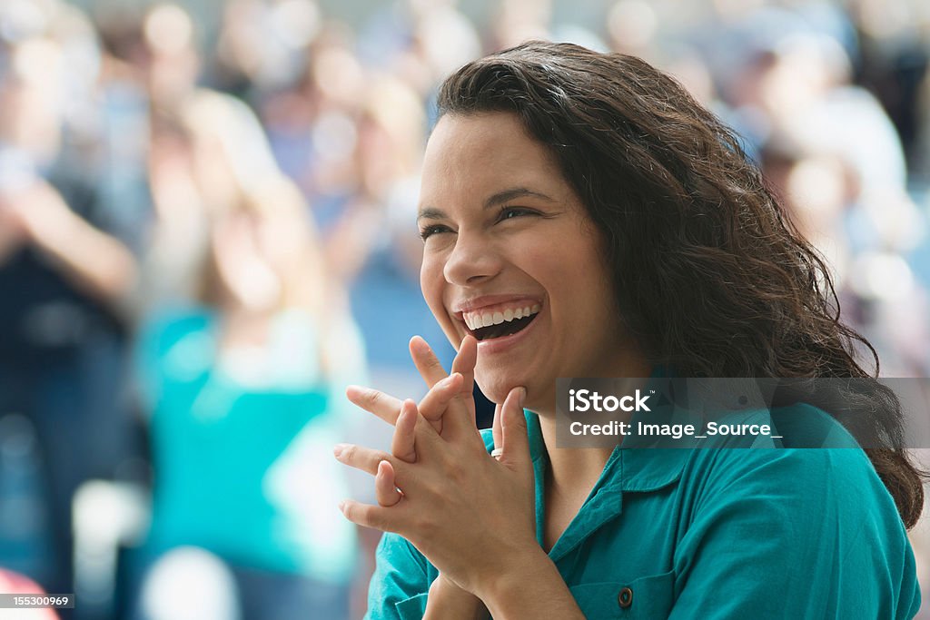 Excited female spectator  Women Stock Photo
