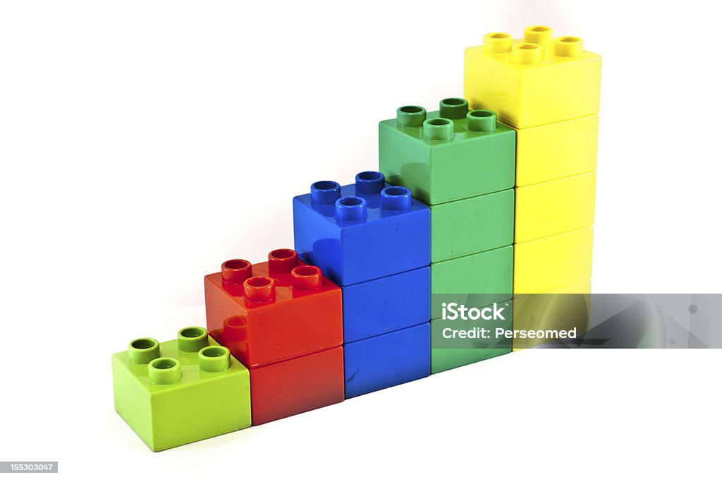 Achievement chart Plastic building blocks on white background. Bright colors. Achievement Stock Photo