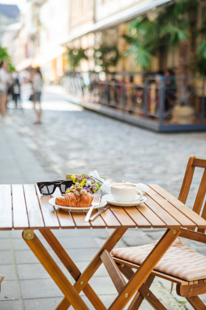 istock With croissants and coffee on the cafe's summer terrace 1553042524