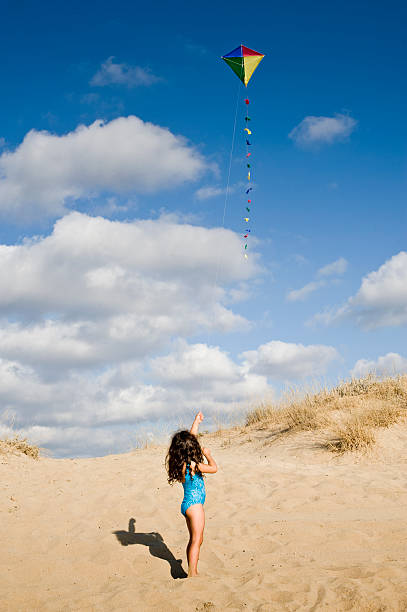istock girl and kite 155305269