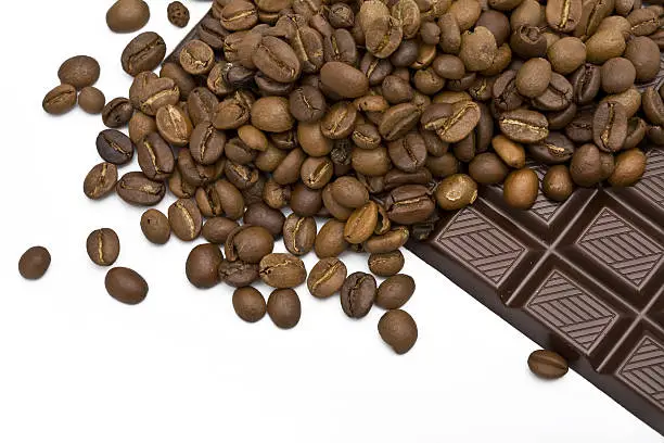 coffee beans and chocolate-bar on white background