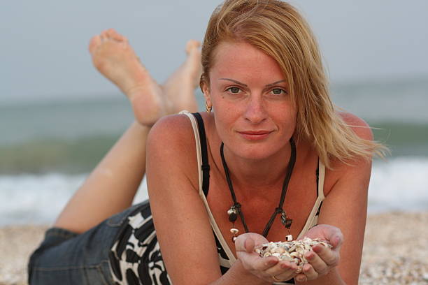 woman near sea stock photo