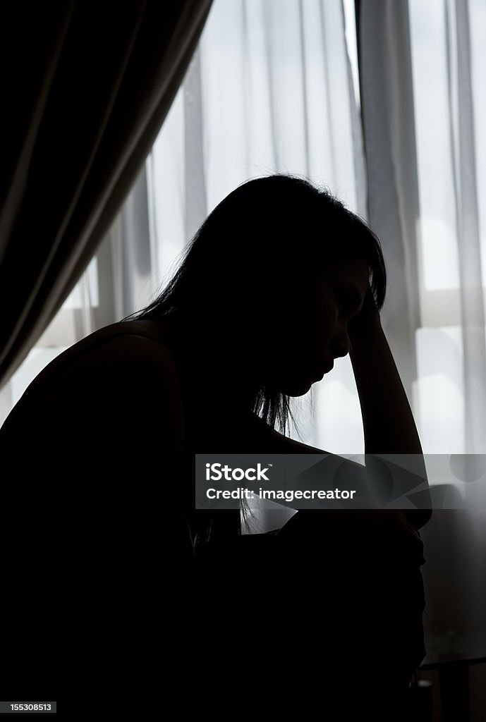 Silhouette einer traurigen lady - Lizenzfrei Betrachtung Stock-Foto