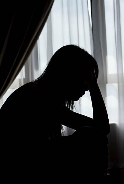 istock Silhouette of a sad lady 155308513