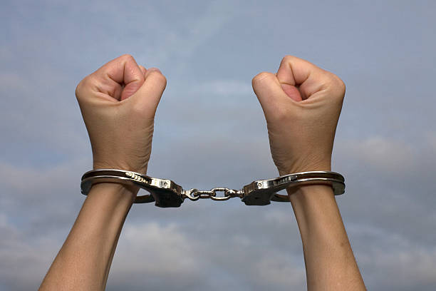 istock Handcuffed angry Woman loosing freedom 155309855