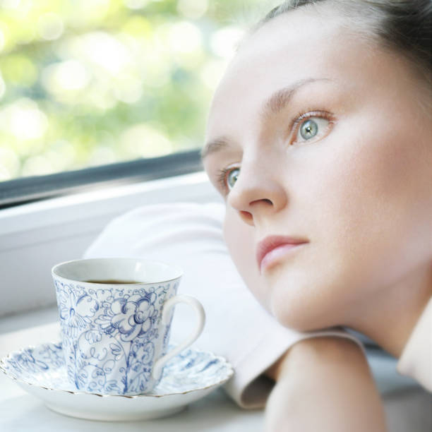istock Girl with cup of coffee 155309994