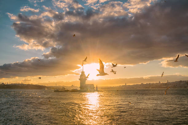 istock Fiery sunset over Bosphorus with famous Maiden's Tower 1553104391