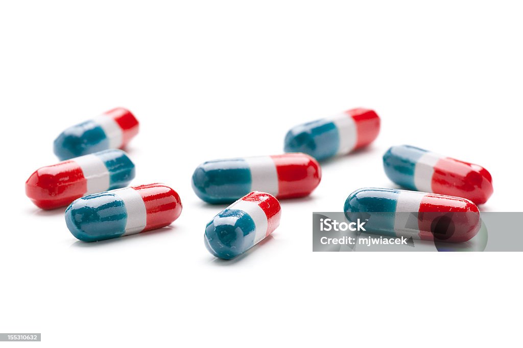 Красный, белый и синий таблетки - Стоковые фото Азидотимидин роялти-фри
