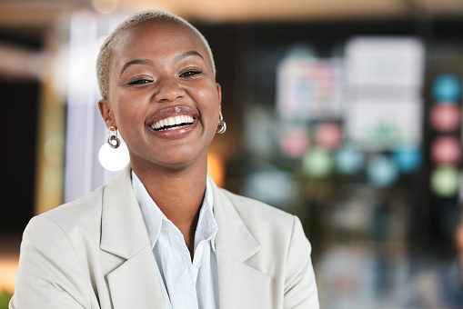 Portrait, smile and black woman in office with mockup, bokeh and startup business ceo at night. Management career, happiness and African businesswoman laughing in corporate work space for overtime.