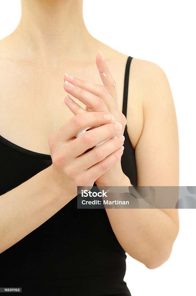 Trattamento della pelle con crema mani asciutte - Foto stock royalty-free di Adulto