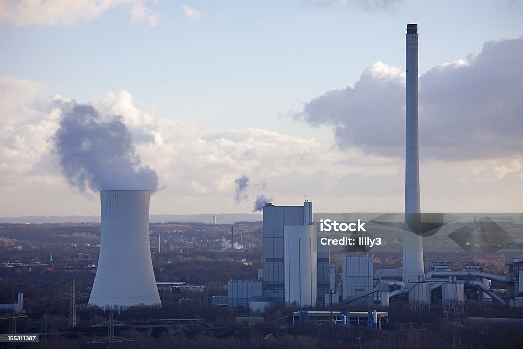 Industrial Plant with smoking Cooling Tower Industrial Plant with smoking Cooling Tower - Recklinghausen, North Rhine-Westphalia, Germany   Recklinghausen Stock Photo