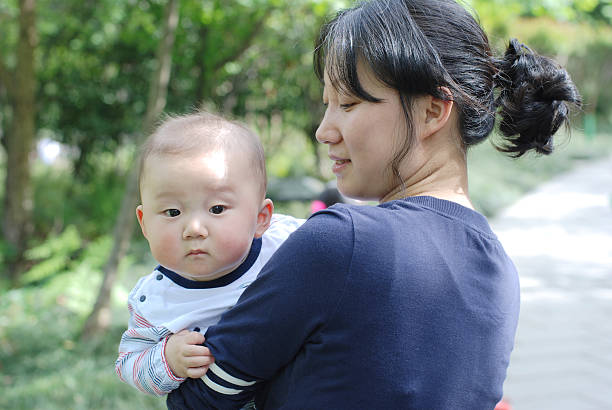 istock Cute baby boy and  his mother 155311413