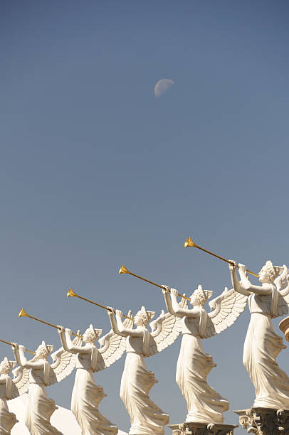 Angels Blowing Trumpets at the Moon stock photo