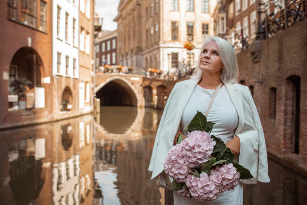 Beautiful Senior Female Traveller in Utrecht stock photo