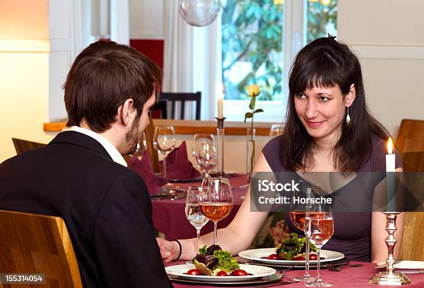 Flirting Over A Romantic Dinner Stock Photo - Download Image Now - Adult, After Work, Anniversary