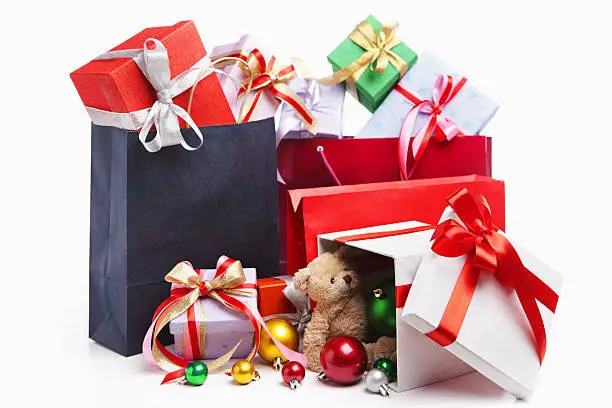 Photo of Group of red and white Christmas gifts on a white background