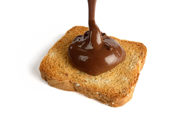 istock slice of crispy bread with chocolate cream 155316056