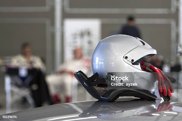 Race Preparation Helmet And Gloves Stock Photo - Download Image Now - Helmet, Pit Stop, Sports Helmet