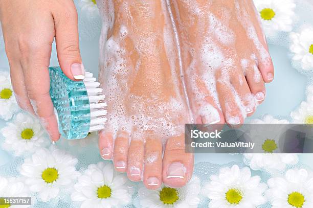 Woman Washes And Cleans Her Foot Stock Photo - Download Image Now - Washing, Adult, Barefoot