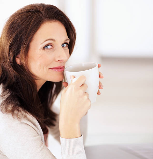 istock Portrait of a mature lady drinking coffee 155317596