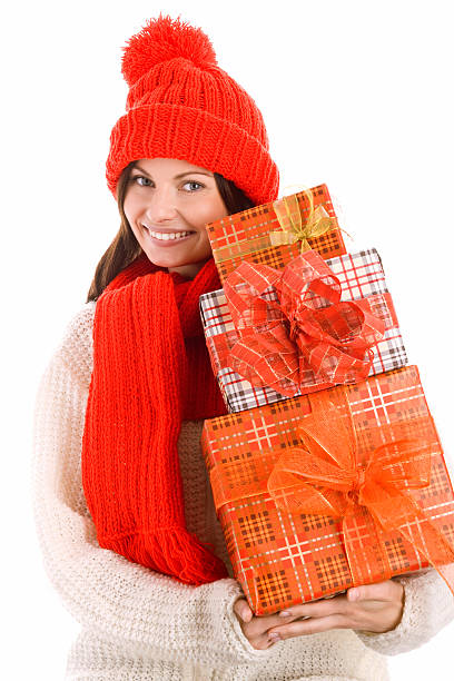 istock Woman holding stack of gifts 155318577