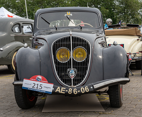Lelystad, The Netherlands, 18.06.2023, Front view of vintage car Peugeot 202 BH from 1948 at The National Oldtimer Day