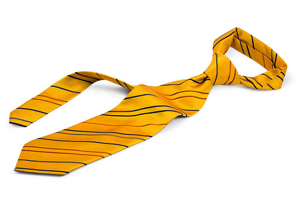 gelbe krawatte - necktie yellow windsor knot isolated stock-fotos und bilder