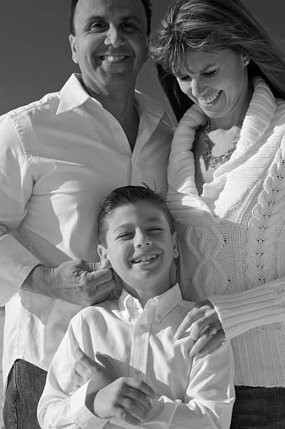istock Family in white on Beach 155319670