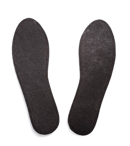 istock Insoles for shoes isolated on white background 1553197596