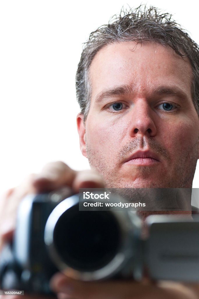 Uomo riprese con la videocamera - Foto stock royalty-free di 30-34 anni