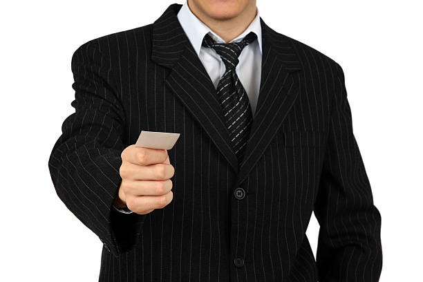 business man holding card stock photo