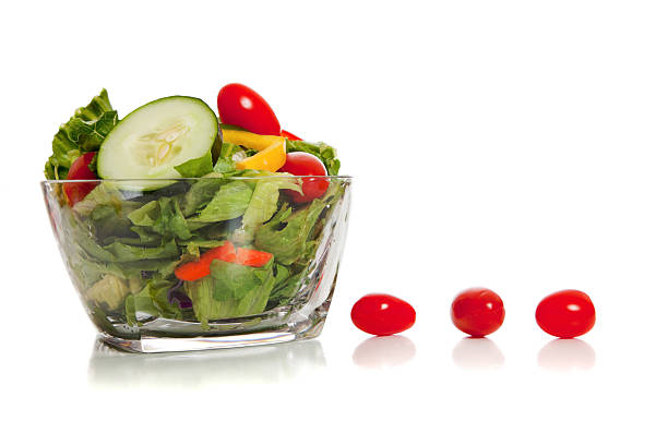 istock Fresh Tossed salad in Glass Bowl with tomatoes 155321586