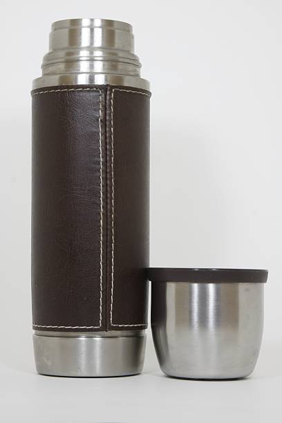 Thermos bottle with a cup stock photo