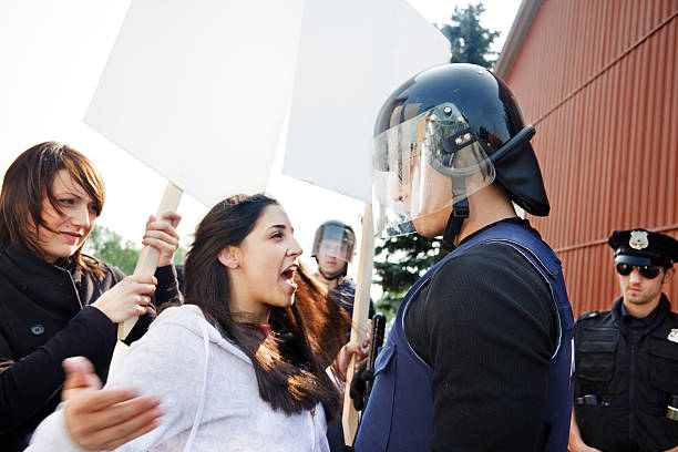 Protester gets pushy stock photo