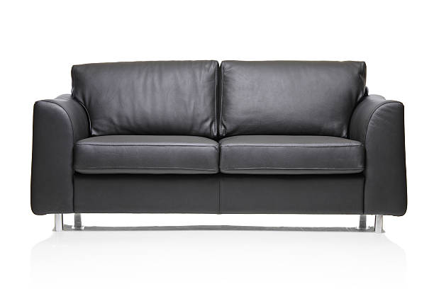 istock A modern black leather sofa isolated on a white background 155323283