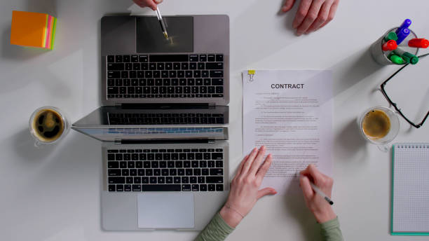 istock Top view of manager give client to sign contract 1553244776