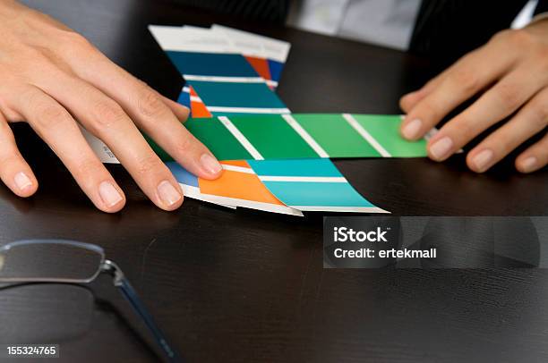Womans Hands Picking Out Swatches Stock Photo - Download Image Now - Blue, Choice, Choosing