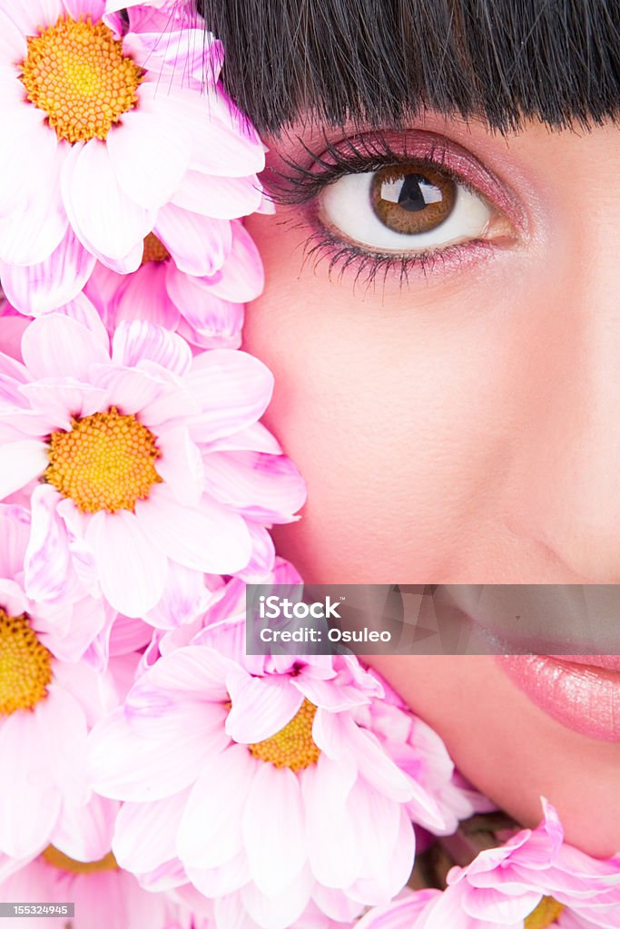 Young woman with flowers Adult Stock Photo